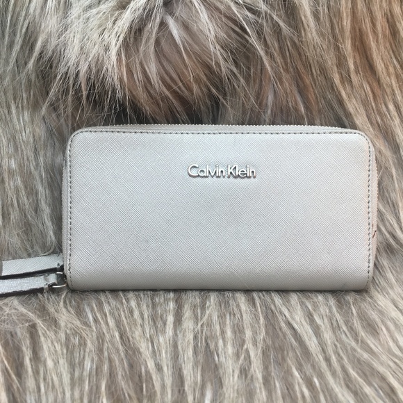 Calvin Klein Handbags - Calvin Klein Silver Wallet